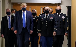 Trump, Koronavirüs salgınının başından beri ilk kez maskeyle görüldü